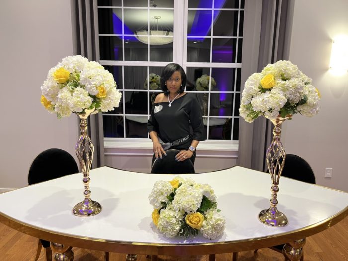sekia owner gold and white table and flower arrangements bouquets