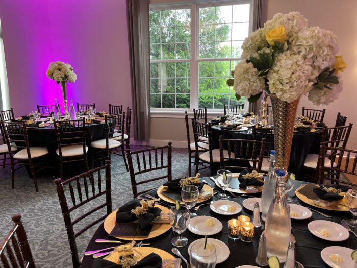 black gold purple lighting dining room set up